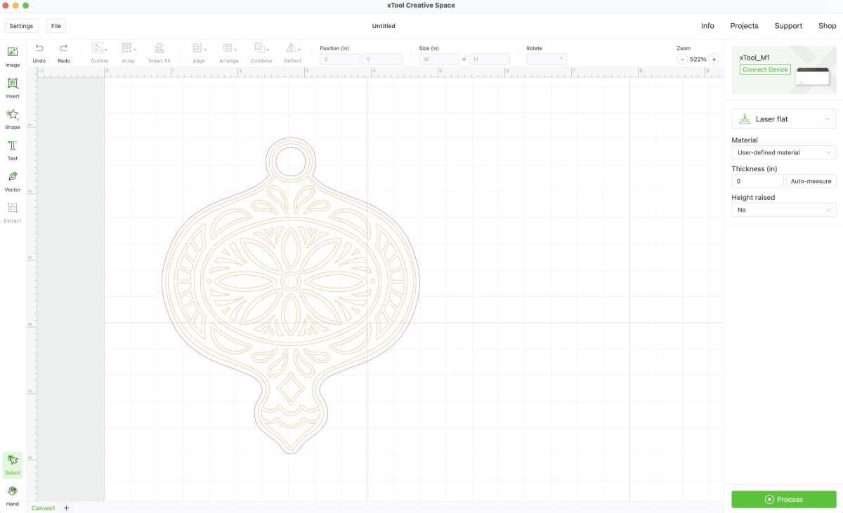 xtool-m1-ornament-on-canvas Screenshot of Creative Space with ornament showing cut and score lines.